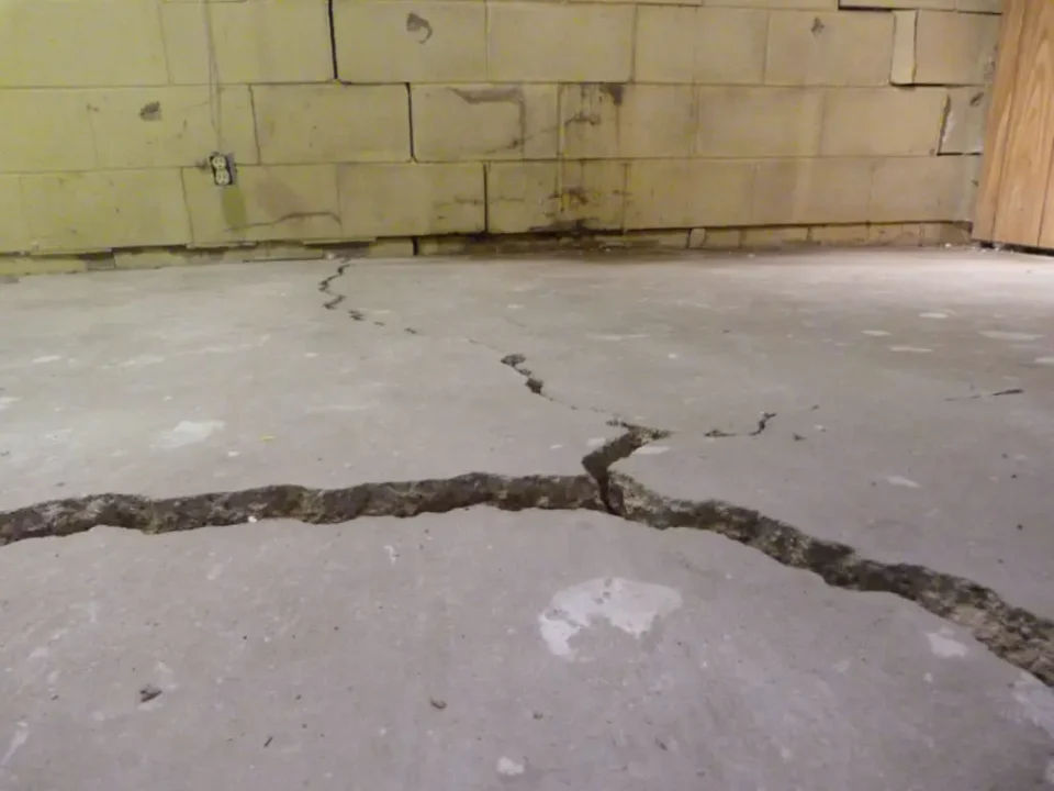 Cracked concrete floor in basement