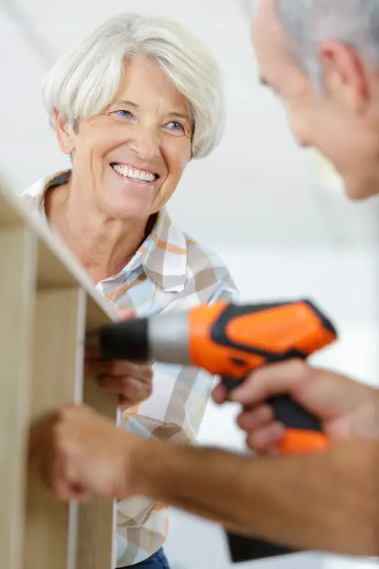 senior couple renovating house