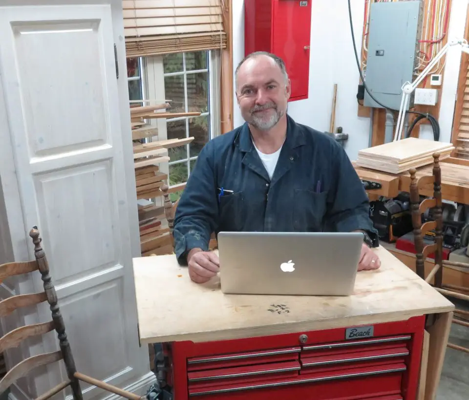man working from home with laptop