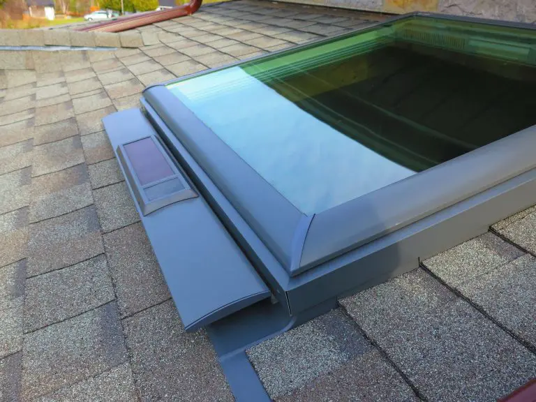 Modern skylight installed on shingled roof