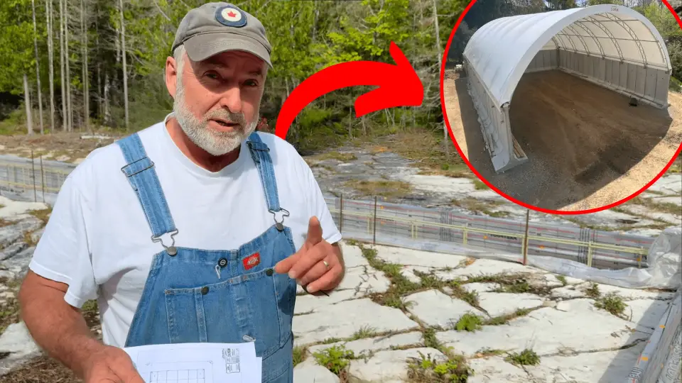 Man discusses building project with structure diagram.
