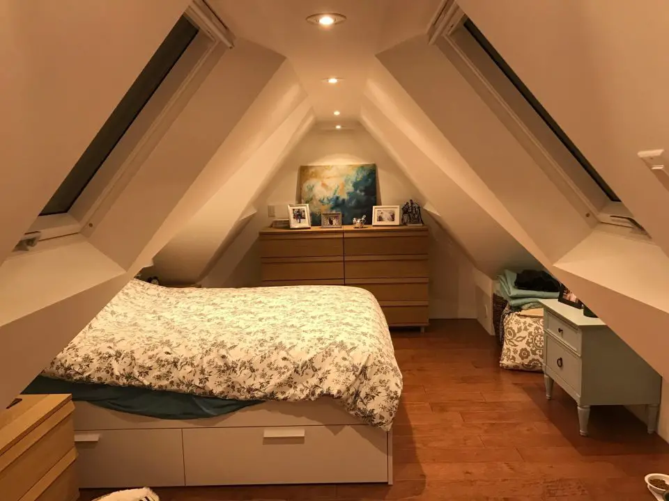 This is the same space as shown above getting spray foamed, except now finished and ready to live in. This sleeping loft includes openable skylights. Even with 8″ of spray foam insulation, the space would still get too hot during summer without ventilation like this.
