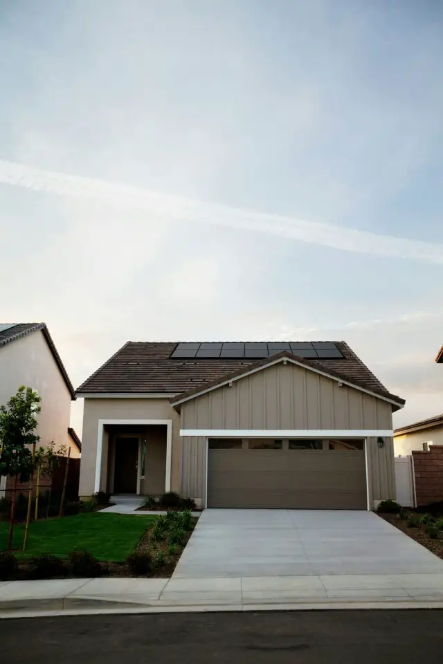 Modern suburban house with solar panels.