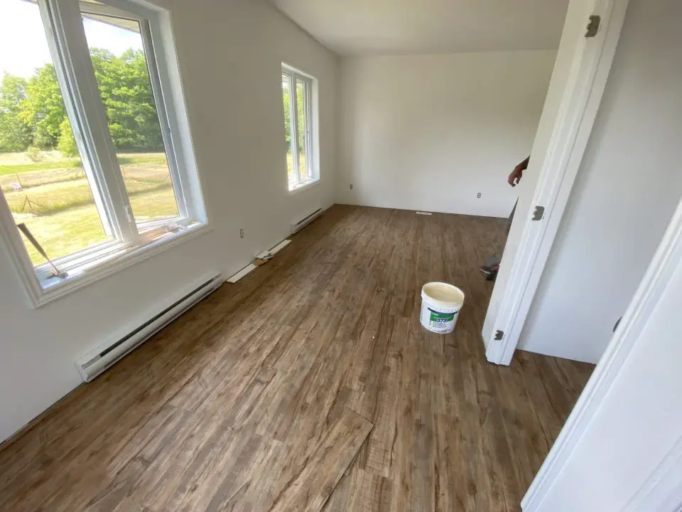 Luxury vinyl flooring going down in the house of my son-in-law and daughter. This is what’s called a “loose lay” style, and it has several advantages.