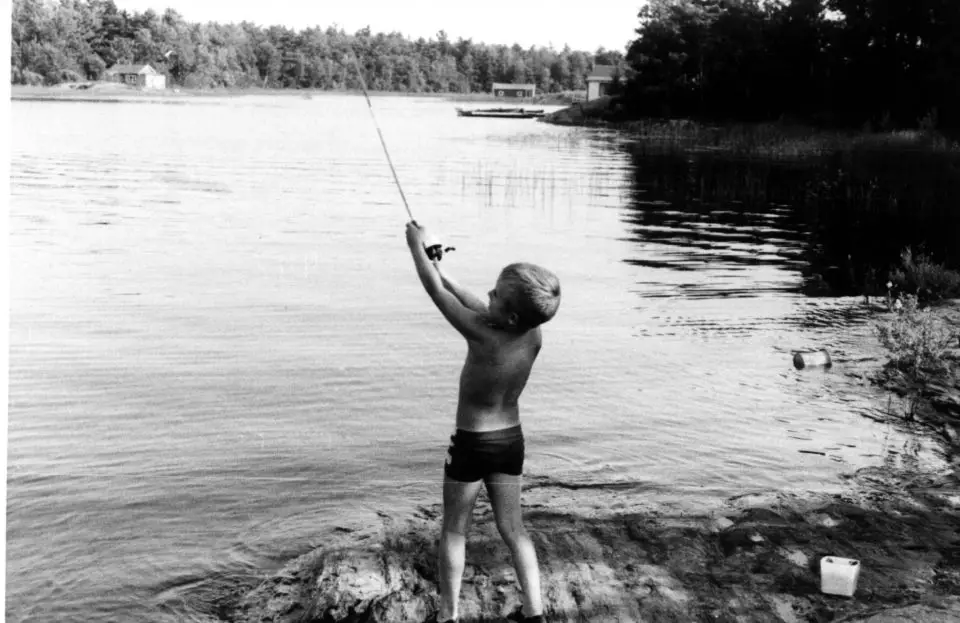 Seven year old Steve Maxwell fishing on the shores of Georgian Bay. Glorious old memories. Oh, that only more kids could experience things like this.