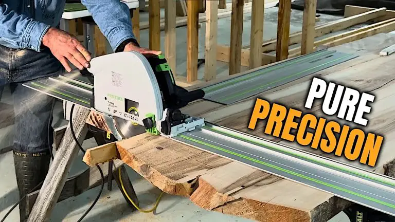 Person using a precision track saw on wood.