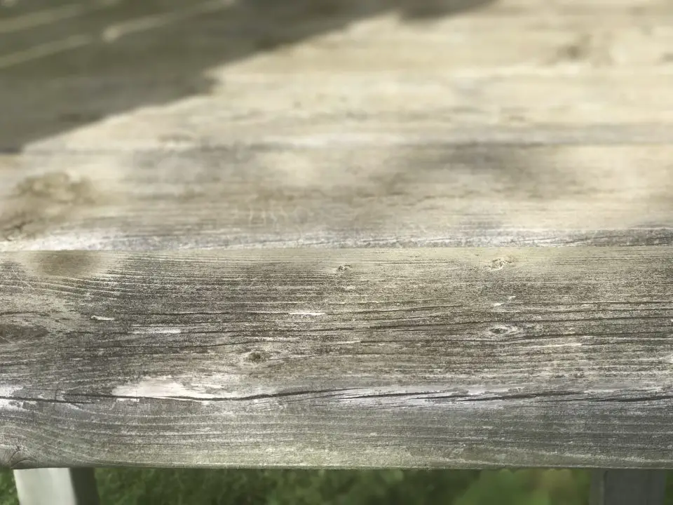 Weathered wooden deck close-up under sunlight