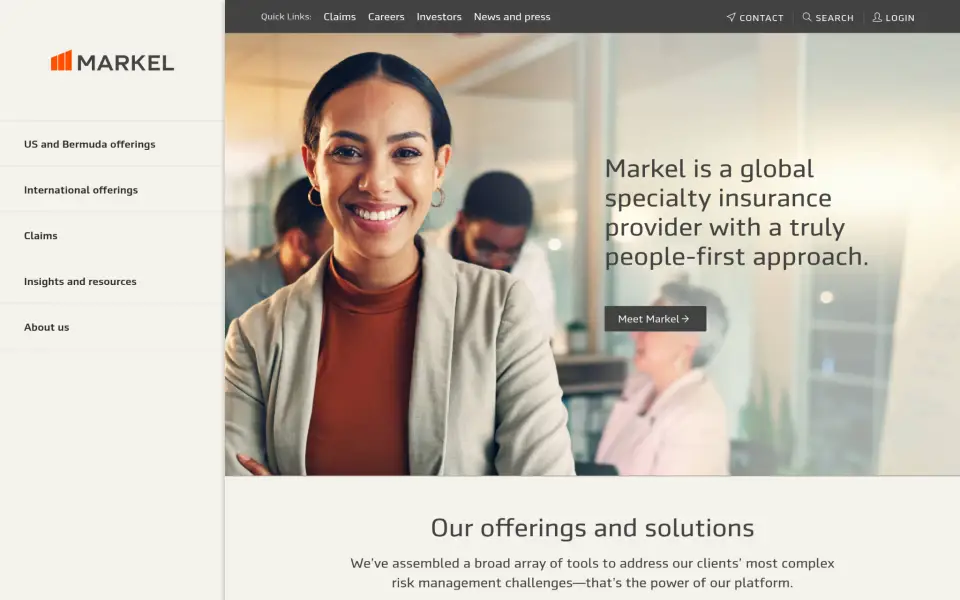 Smiling professional woman at Markel insurance office.